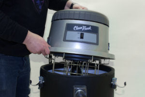 Place the vacuum head on top of tank