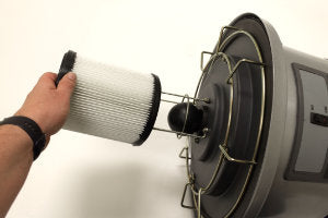 Place the HEPA pleated filter over the float cage